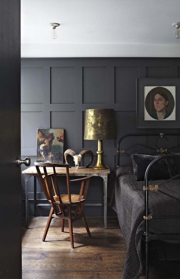 We love the distressed brass against the dark walls.